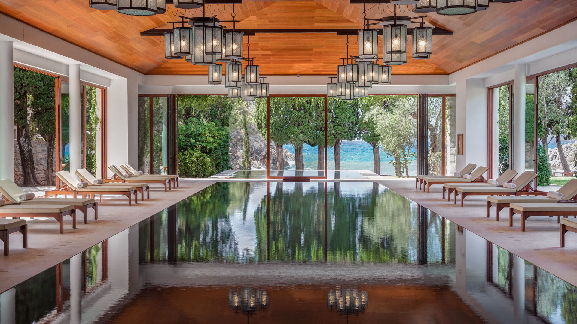 Sun loungers and plunge pool on a sea-view terrace at Aman Sveti Stefan, Montenegro