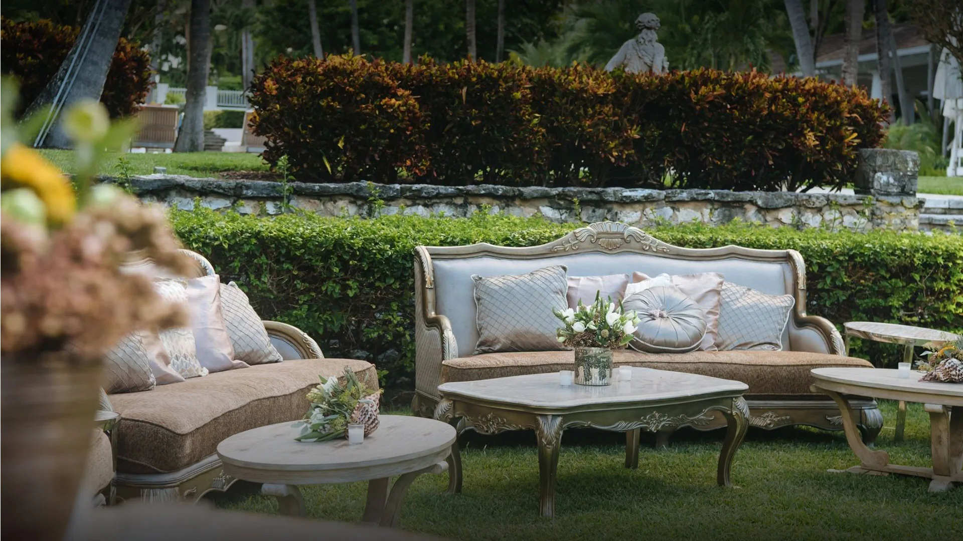 Elegant outdoor lounge setup on the lawn at Four Seasons Ocean Club, Bahamas