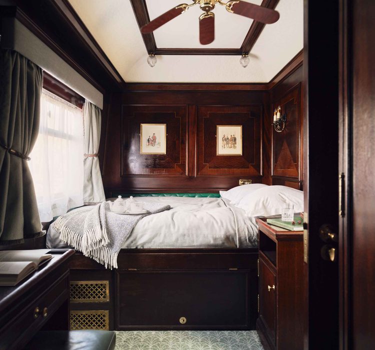Marquetry-panelled double cabin aboard the Royal Scotsman