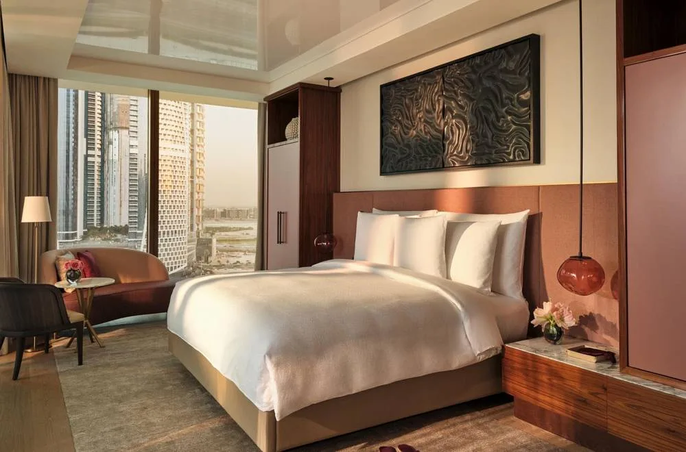 Marina Duplex suite bedroom in blush tones at The Lana, Dubai